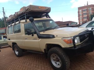 land cruiser hard top with a tent